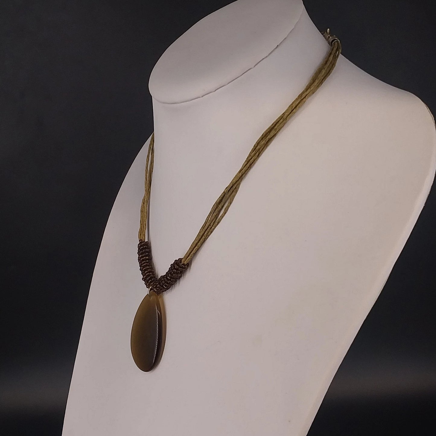 Linea Pele Brushed Gold Teardrop Pendant Necklace With Multi Strand Brown Cord