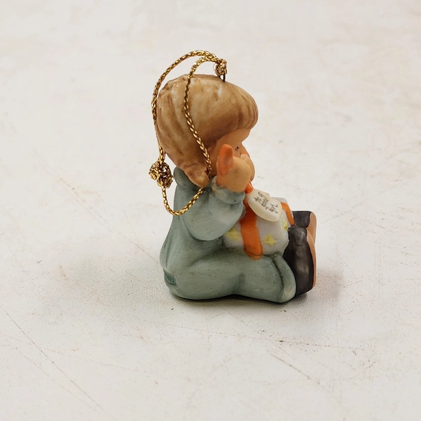 Berta Hummel LITTLE GIFT WRAPPER Ornament 1997 Goebel Porcelain Christmas