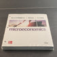 Microeconomics 22e ISE by Stanley Brue McGraw Hill Hole Punched For Binder NOS