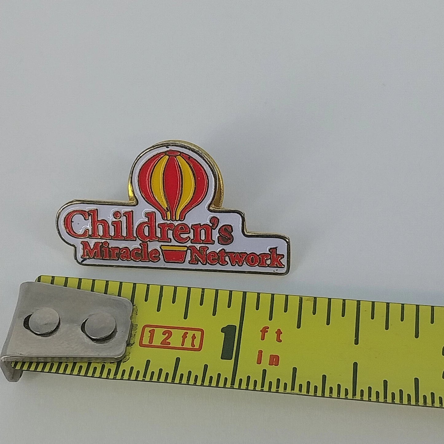 Children's Miracle Network Balloon Logo Enamel Gold Tone Lapel Pin Brooch Vintag