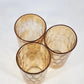 Jeannette Hex Optic Glasses Set of 3 Iridescent Marigold Carnival Glass 5" 8 oz