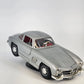 Bburago Mercedes-Benz 300 SL Gullwing 1:24 Diecast Silver Car with Stand 1954