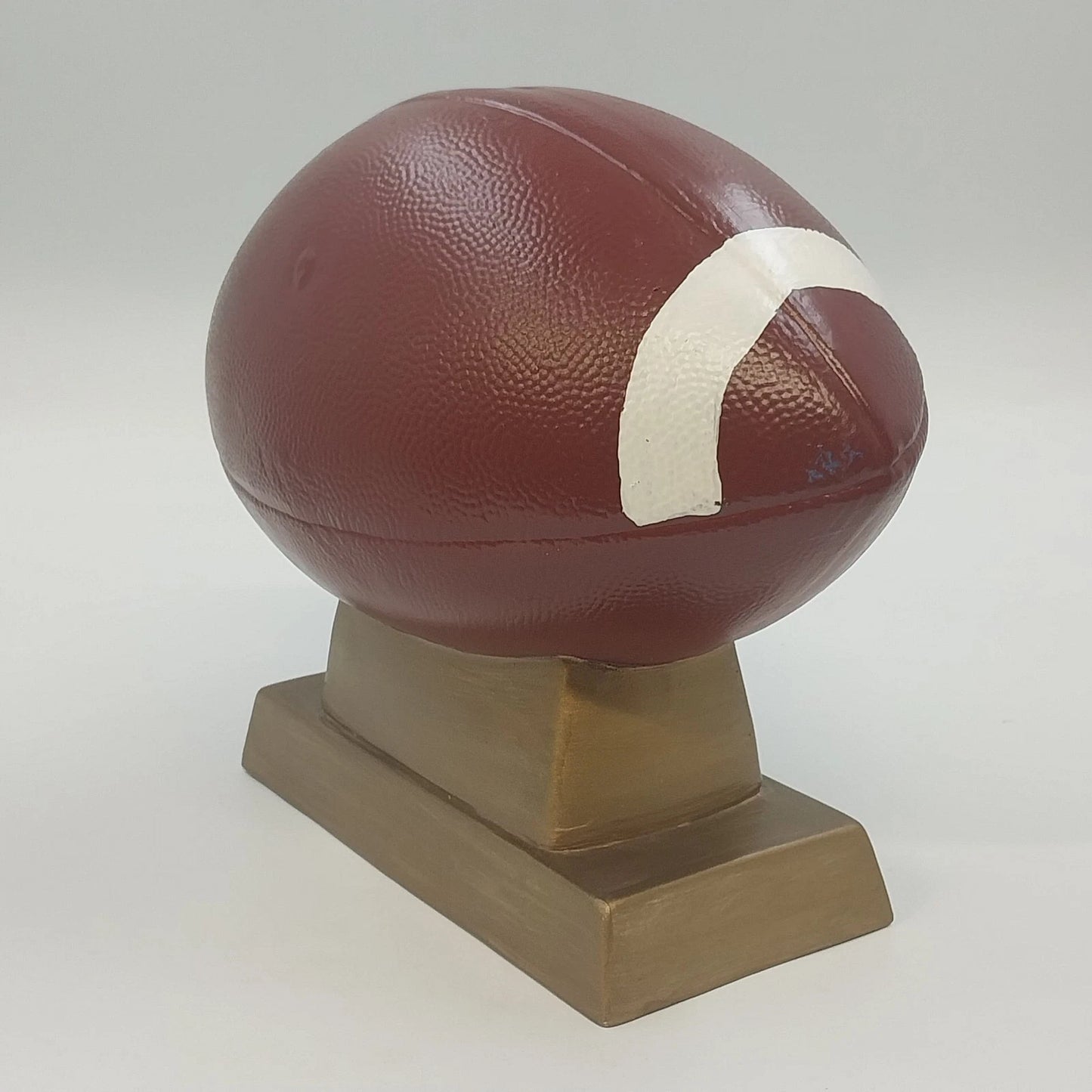 Ceramic Football Coin Bank Textured Sport Piggy Bank Brown on Pedestal Base 9.5"