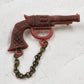 Title: Western Revolver Pistol Brooch Pin Red Miniature Gun Chain Novelty Vtg