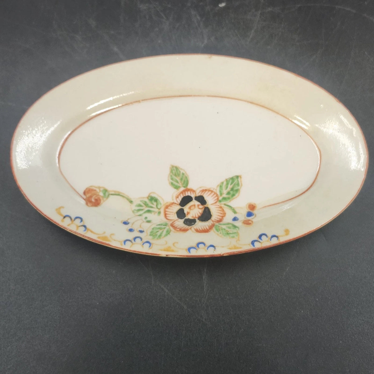 Vintage Japan porcelain oval serving dish with hand-painted floral design