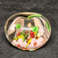 Clear Glass Apple Shaped Paperweight with Pink and Multicolor Flowers 3" Across