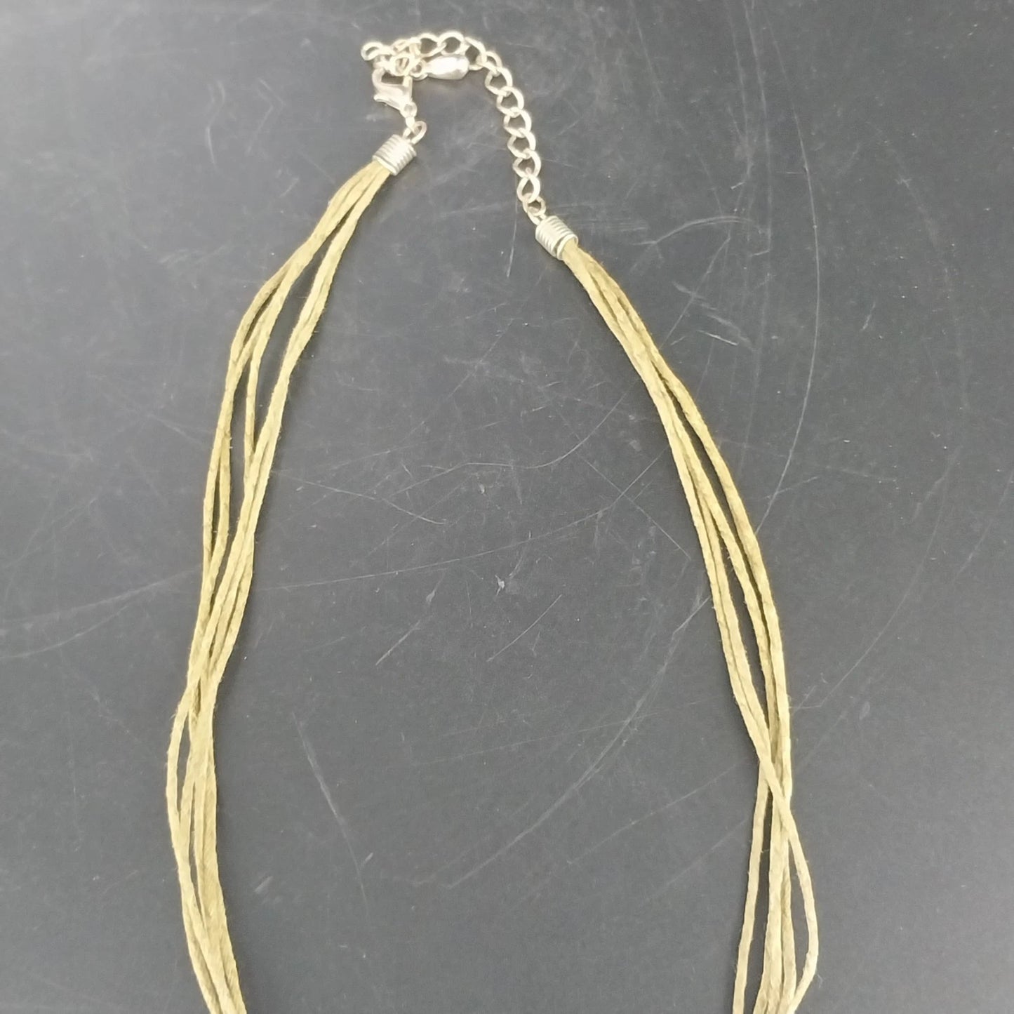 Linea Pele Brushed Gold Teardrop Pendant Necklace With Multi Strand Brown Cord