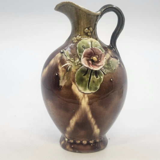 Vintage G. Wyand pottery pitcher with brown drip glaze and floral design