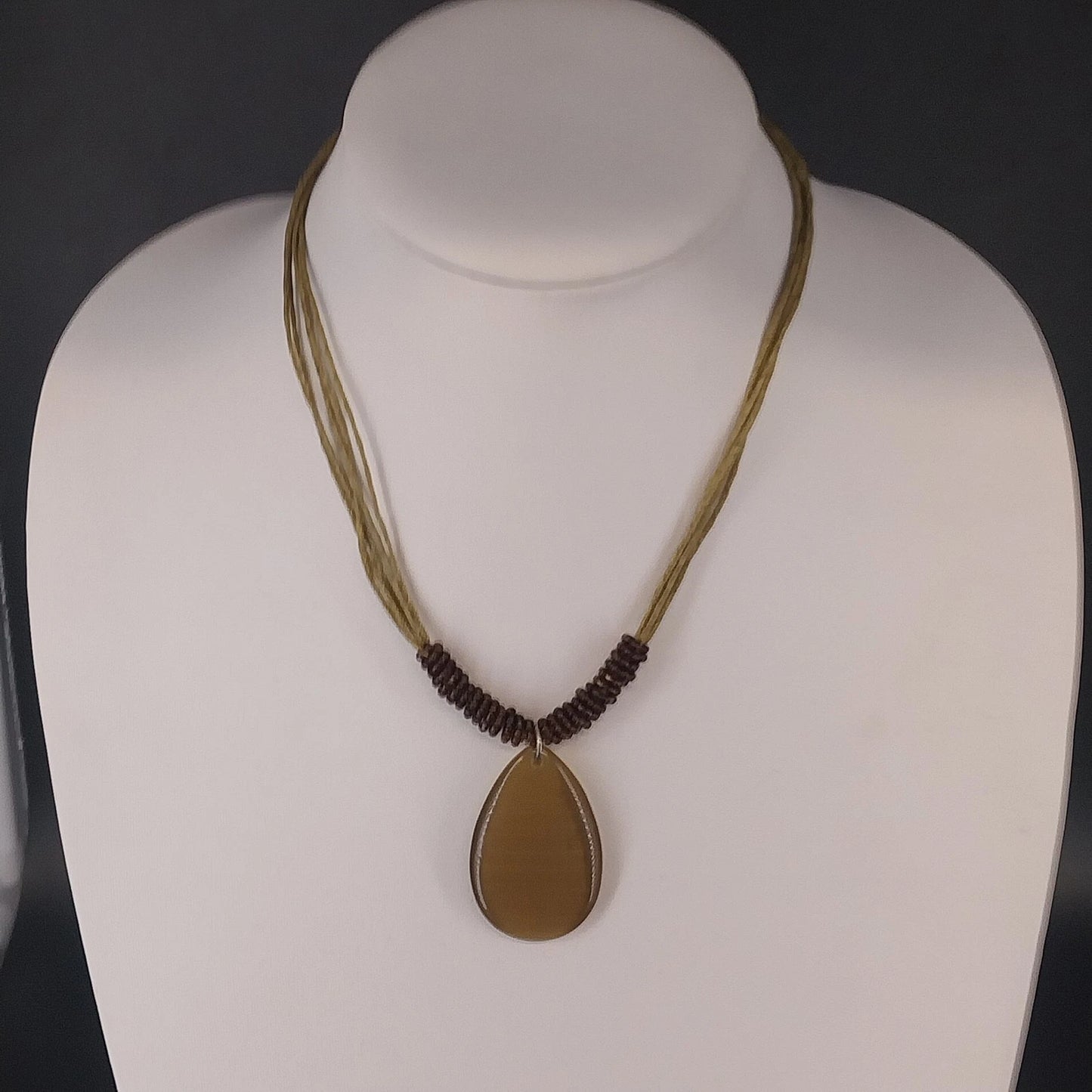 Linea Pele Brushed Gold Teardrop Pendant Necklace With Multi Strand Brown Cord