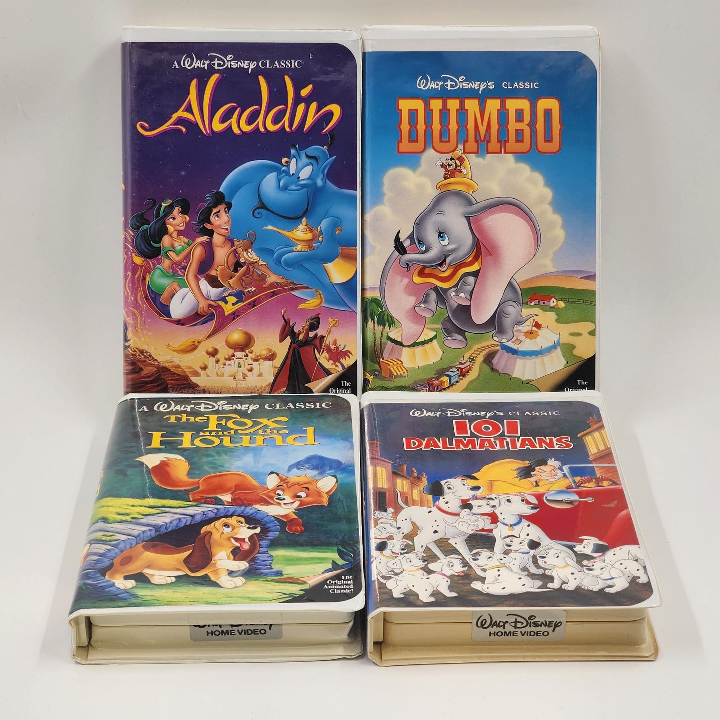 Lot Of 4 Walt Disney Classic VHS Movies ALADDIN Dumbo 101 DALMATIANS Fox & Hound