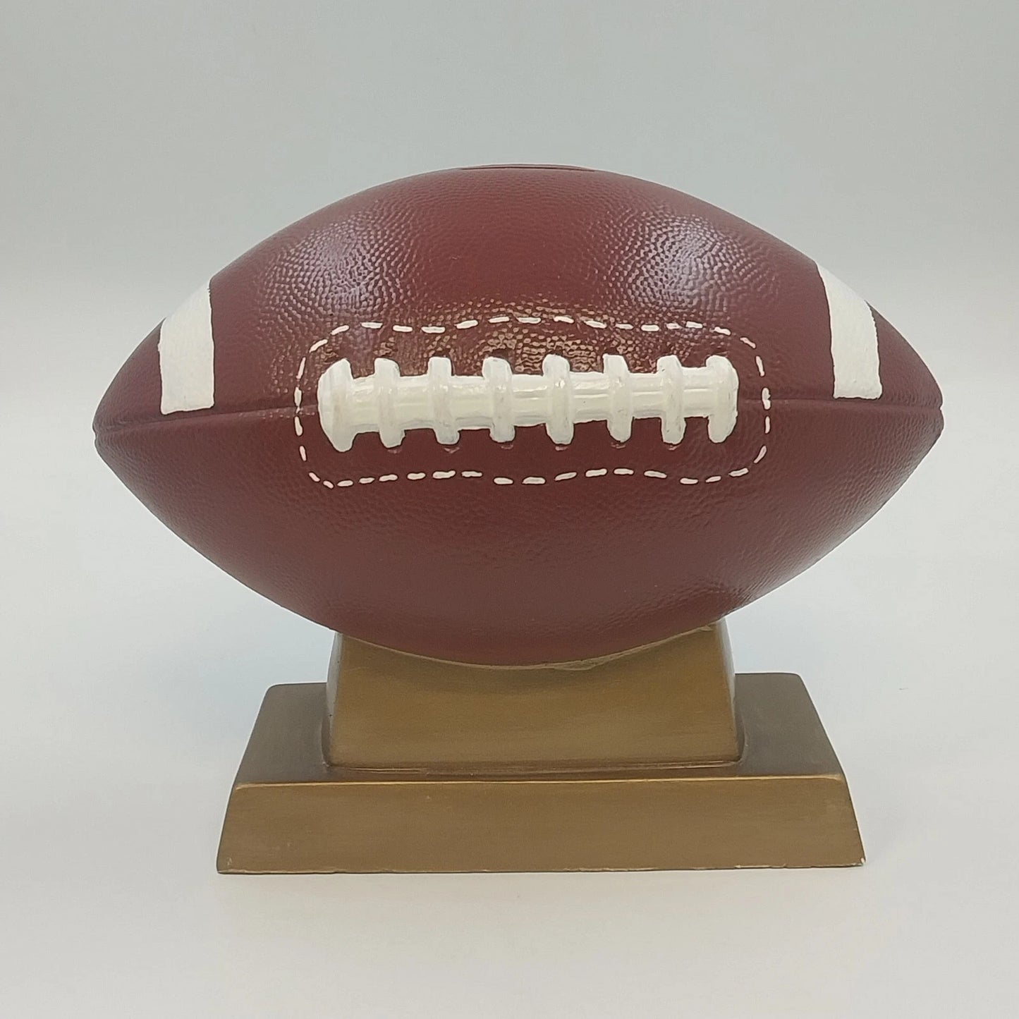 Ceramic Football Coin Bank Textured Sport Piggy Bank Brown on Pedestal Base 9.5"
