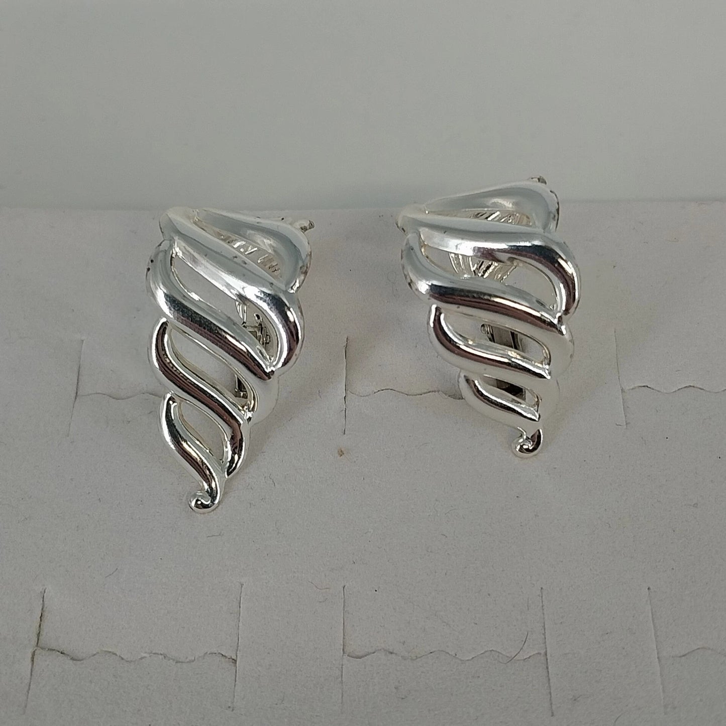 Napier Silver Tone Clip On Screw Back Earrings Swirl Half Hoop Polished Vintage