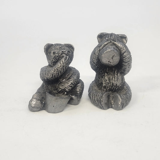 Two vintage silver-gray pewter bear figurines with textured fur