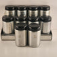 Spun Aluminum Salt Pepper 8 Named Spices and Rack Black Bakelite Lids W Germany