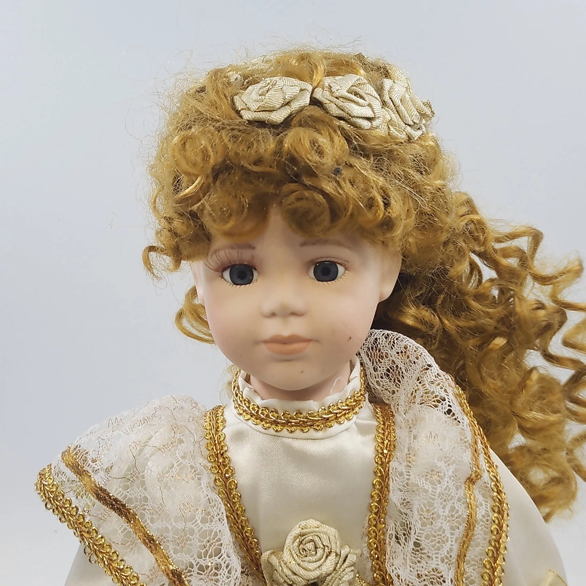 16-inch vintage porcelain Victorian lady doll in cream and gold dress