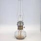 Aladdin Model 23 kerosene lamp with brass burner and clear glass base