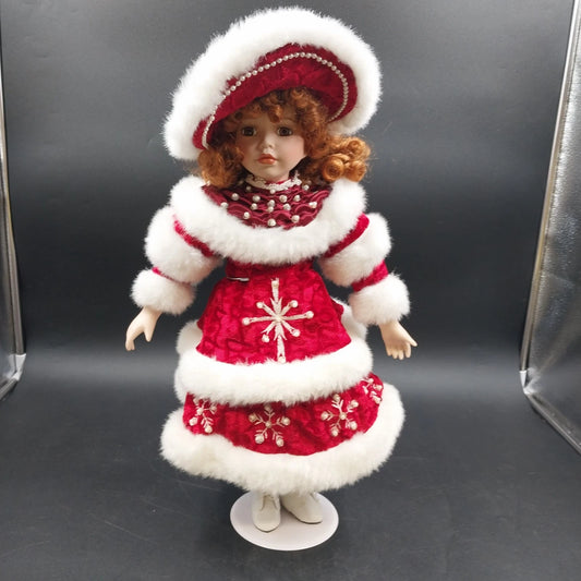 American Classics musical porcelain Christmas doll 19 inches