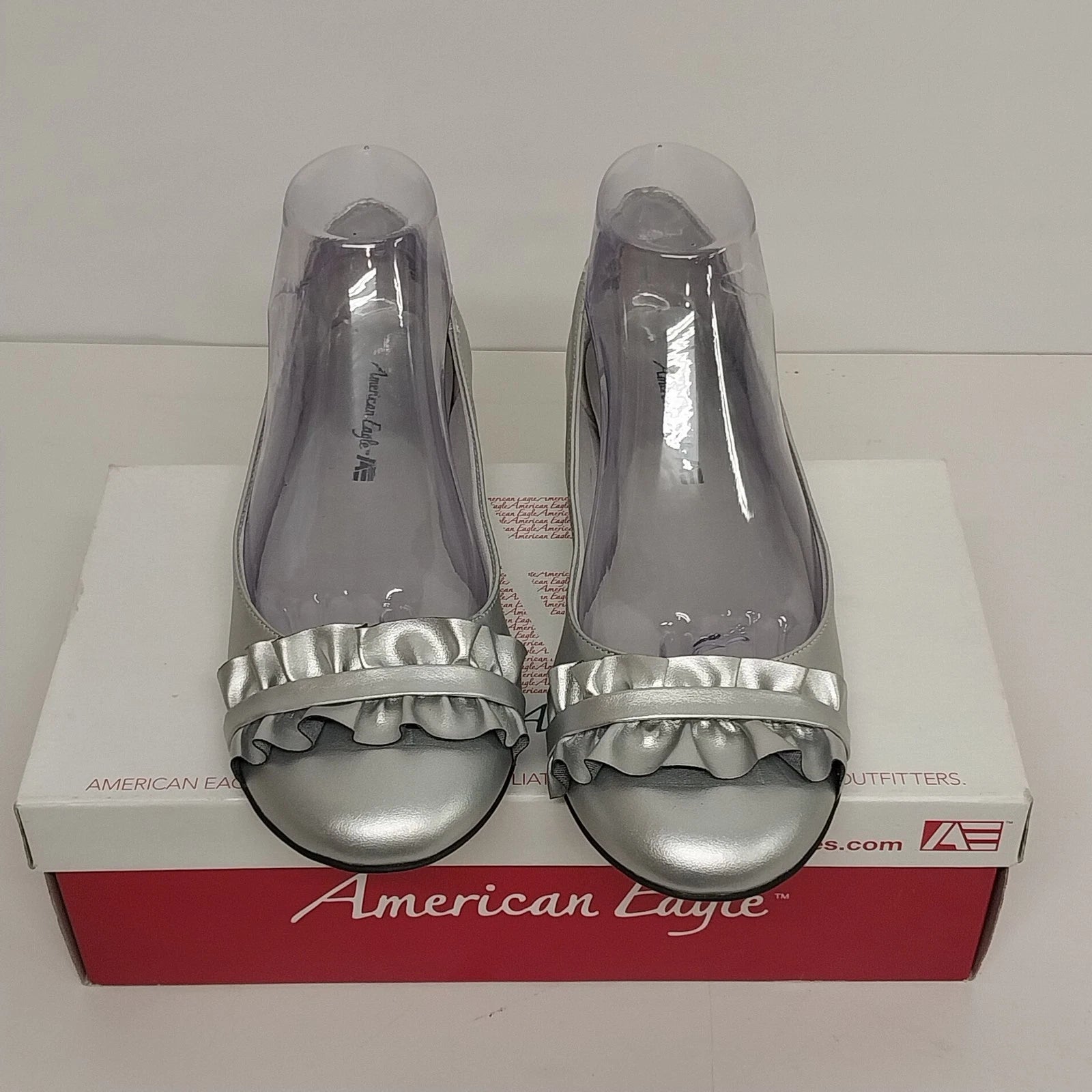Silver metallic American Eagle Cora ballet flat sandals with ruffled trim