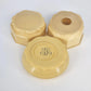 Antique Art Deco celluloid vanity set with powder jars and hair receiver