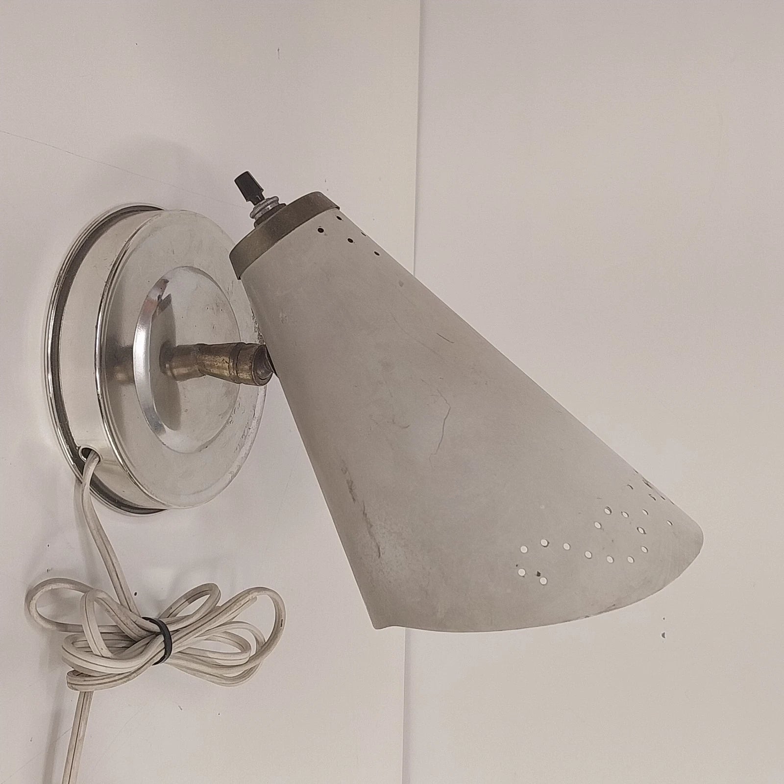 Vintage Mid-Century Modern atomic cone wall lamp with chrome shade and adjustable neck