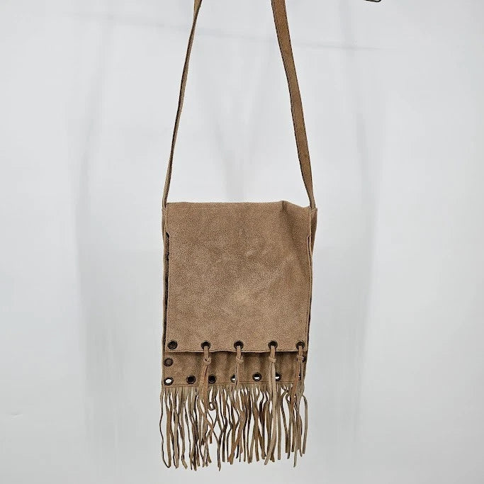 Beige suede boho shoulder bag with fringe tassels and open rivet details