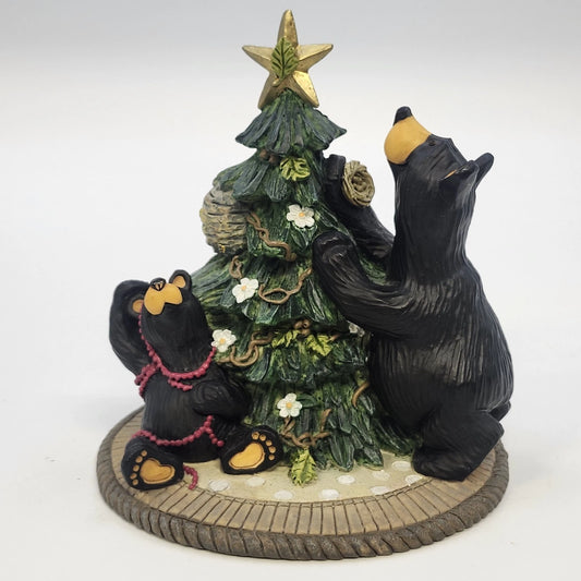 Bearfoots figurine with two black bears decorating a Christmas tree