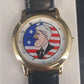 Vintage Bill Clinton novelty watch with growing nose mystery dial design