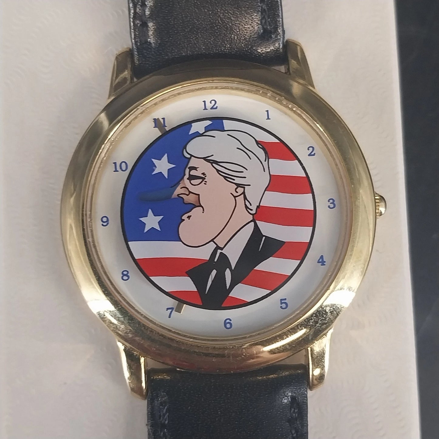 Vintage Bill Clinton novelty watch with growing nose mystery dial design