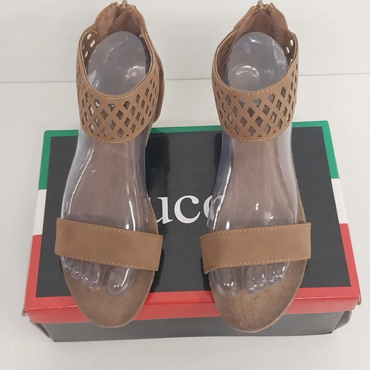 Brown Bucco Capensis Bororo sandals with perforated design and ankle strap