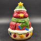 Christmas cookie jar with burgundy bird wearing festive hat and scarf