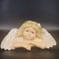 Cream ceramic angel figurine for shelf or headboard decor