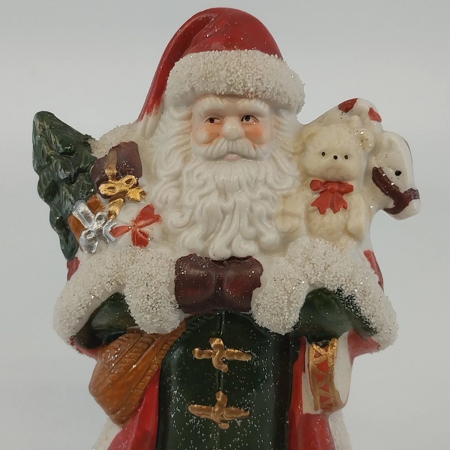 Ceramic Santa figurine with Christmas tree and teddy bear