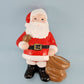 ceramic santa figurine football bag hand painted
