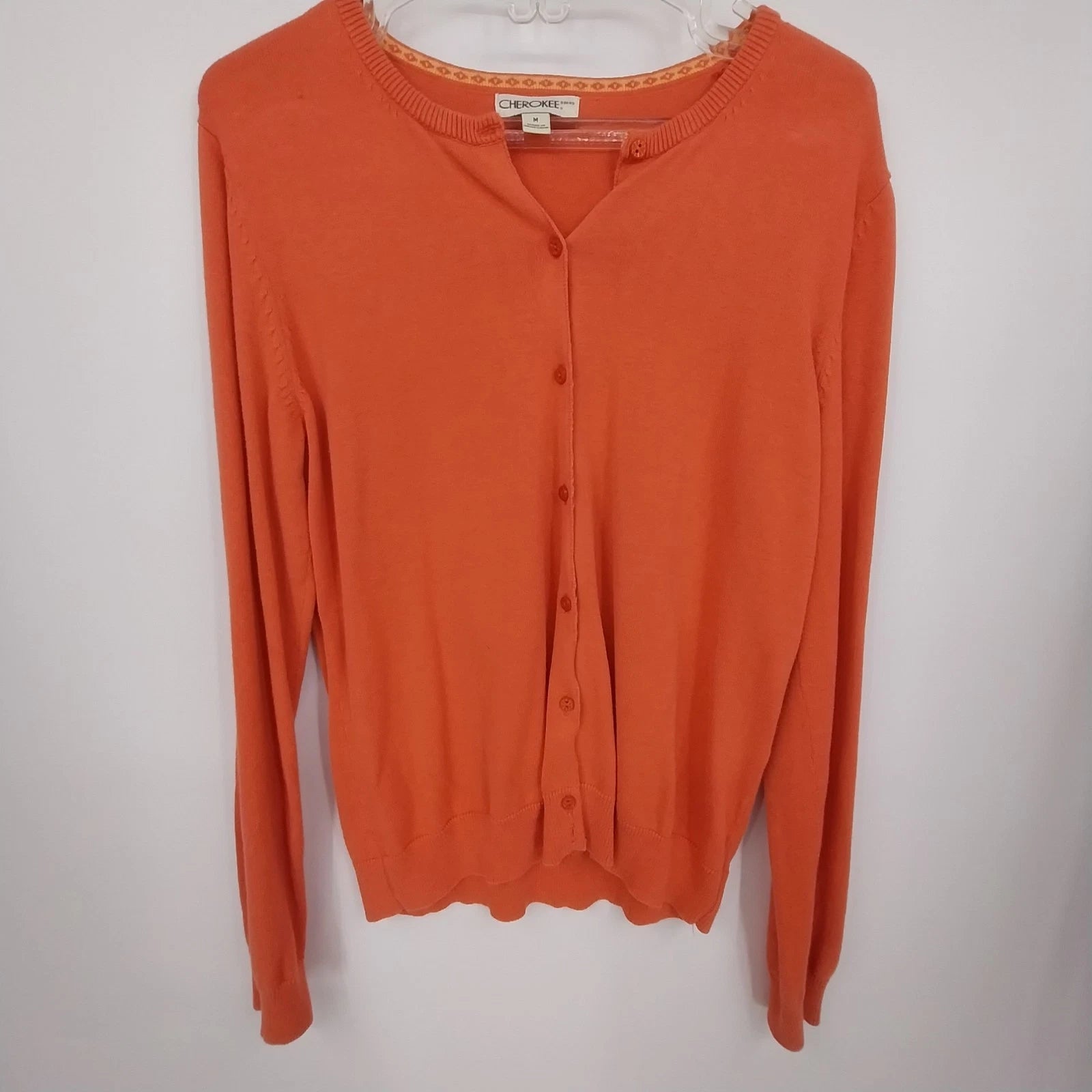 Cherokee women's orange cardigan sweater with button front and lightweight knit design