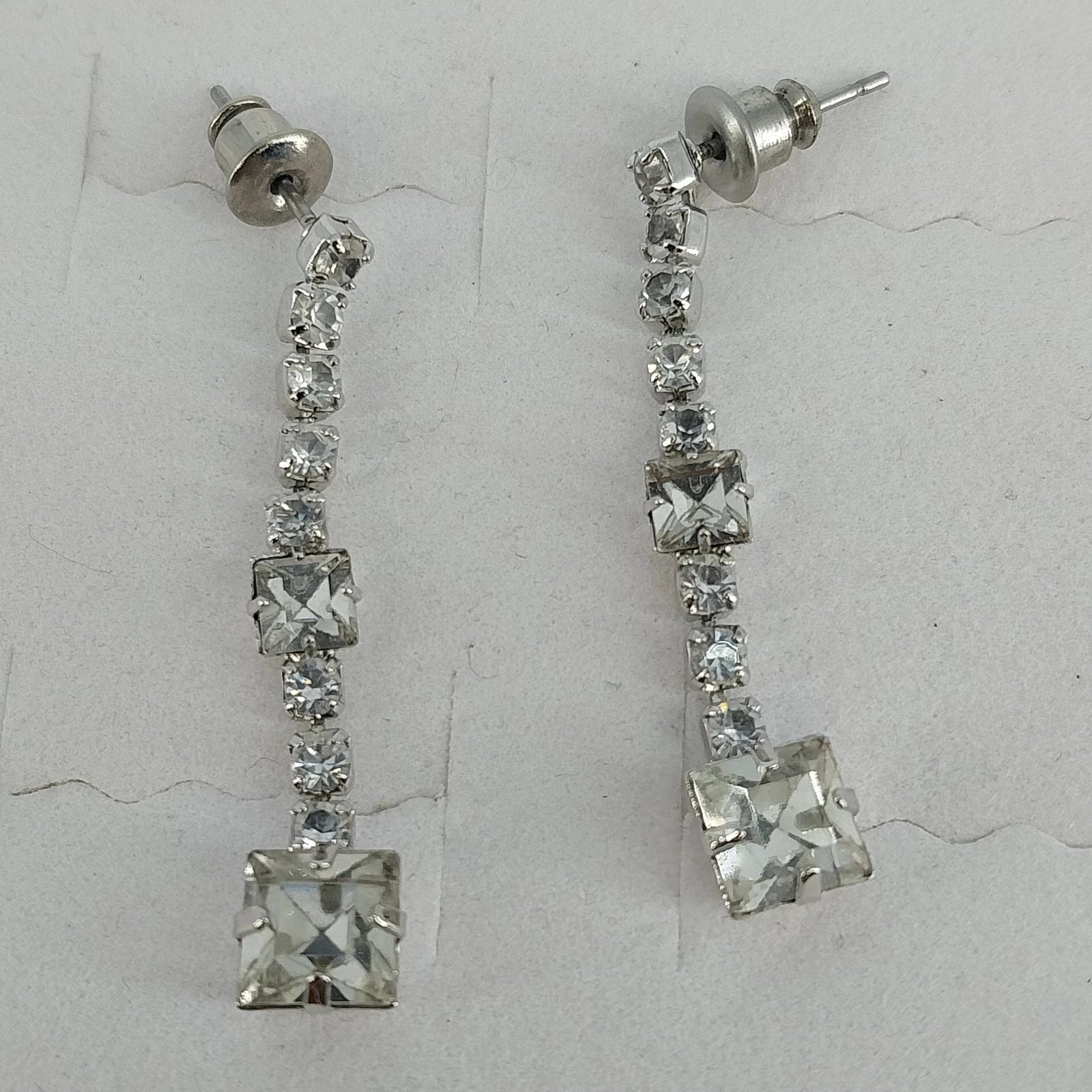 Silver tone clear crystal square dangle earrings