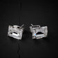 Clear emerald cut crystal stud earrings silver tone