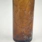Vintage 10 inch dark amber Consumers Brewery Co beer bottle from Newark Ohio