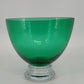 Crate and Barrel emerald green art glass bowl with clear pedestal base
