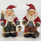 Set of vintage resin Santa figurines holding birdhouse and Christmas tree
