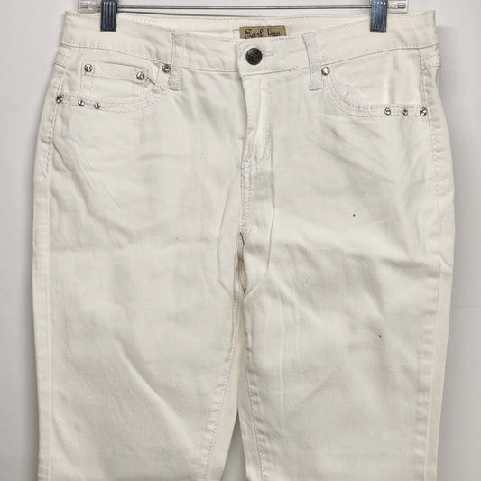 White straight leg denim jeans with rhinestone accents