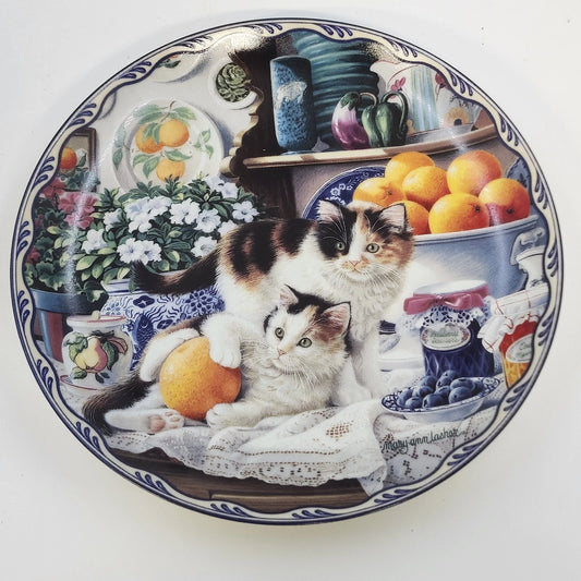 Bradford Exchange Emily & Alice in a Jam collectible porcelain plate featuring two kittens on a country kitchen table with oranges, blueberries, flowers, and a jar of jam.