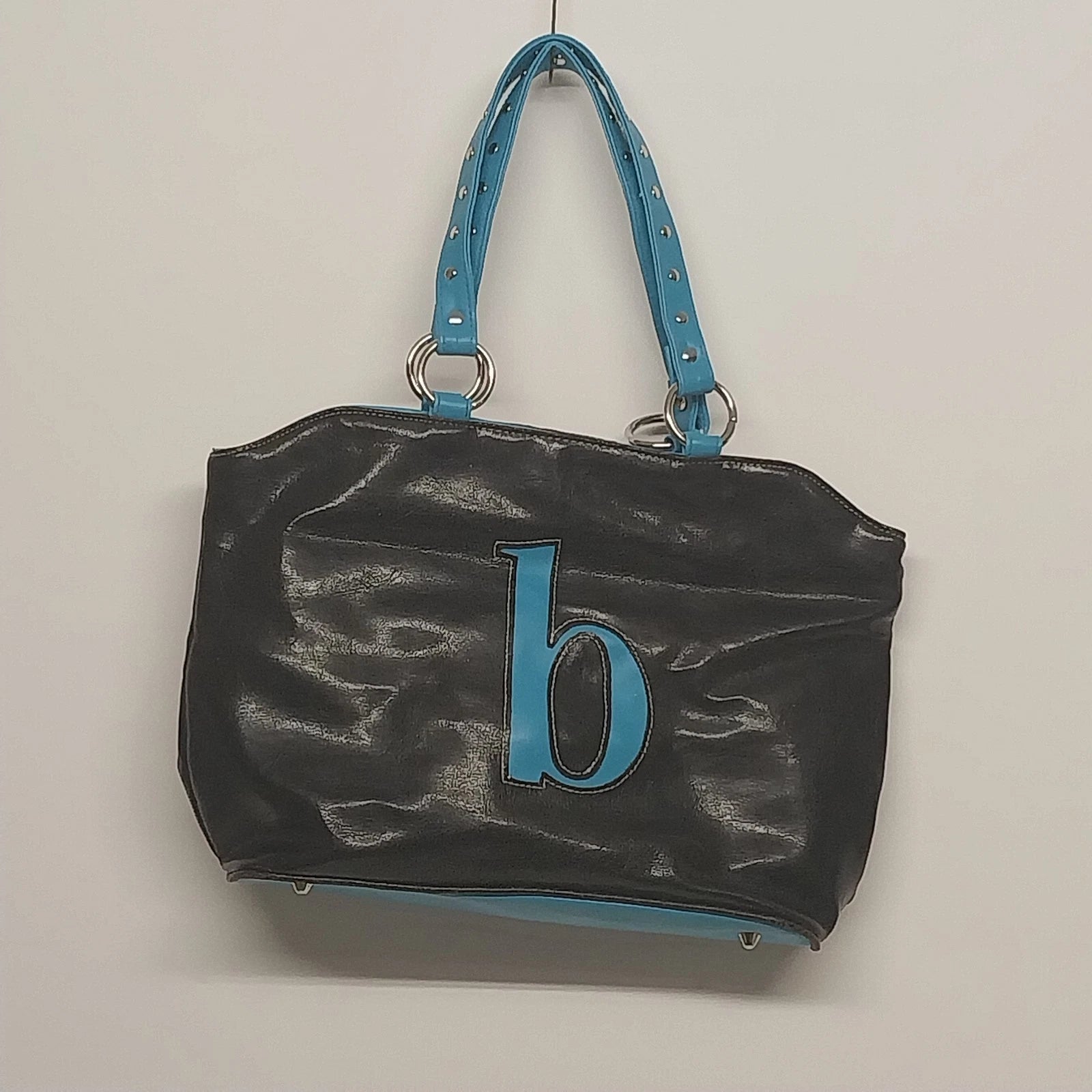 Black Fashion Express tote bag with blue shoulder straps and stitched logo detail