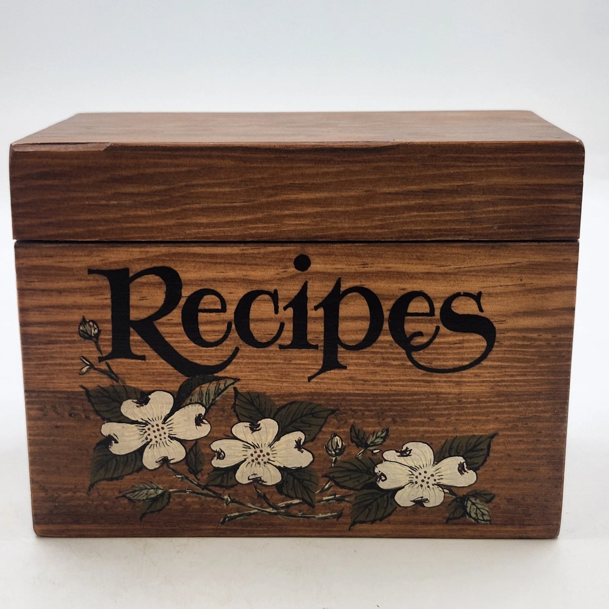 Brown wooden recipe box with floral design and hinged lid