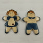 Ceramic gingerbread man and woman Christmas brooch pins in green outfits