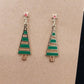 Gold tone Christmas tree earrings with red and green enamel accents