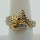 Gold tone snake wrap bypass ring with black eyes size 8