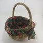 Gold oval wicker basket with removable holiday fabric liner and handles