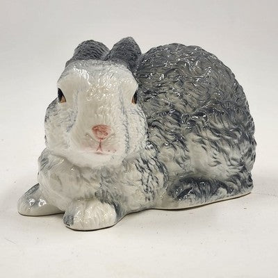 Gray bone china rabbit figurine with white face and ears