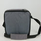 Gray camera shoulder bag with 3 compartments and adjustable strap