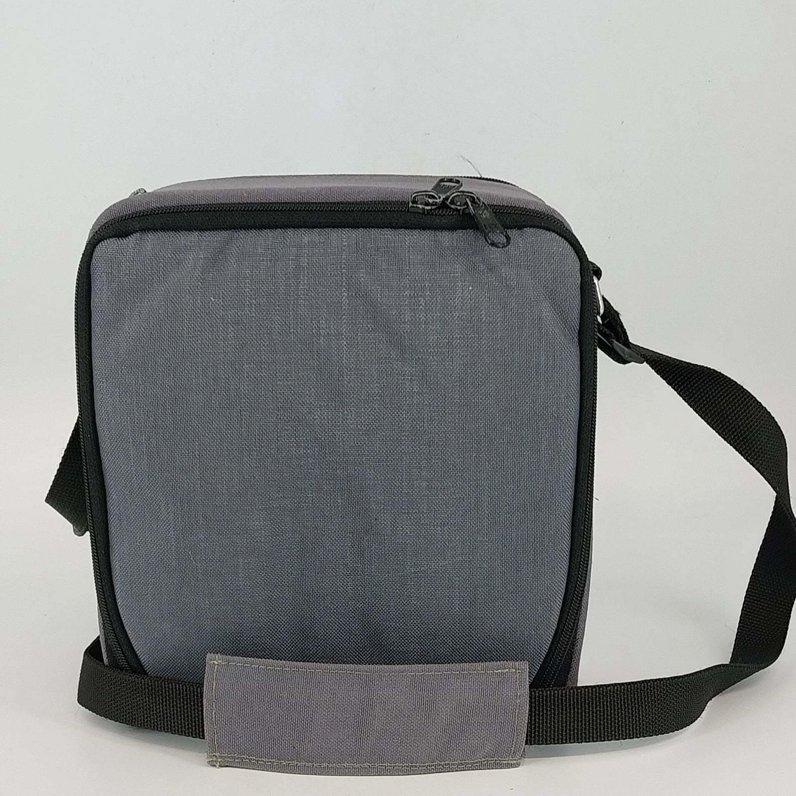 Gray camera shoulder bag with 3 compartments and adjustable strap